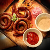 купить Ассорти колбасок в Хоспере Ассорти колбасок в Хоспере заказать доставку ROJO ресторан Алматы